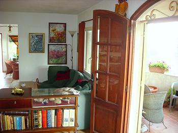 Wohnzimmer mit Zugang zur Terrasse Wohnzimmer mit Zugang zur Terrasse