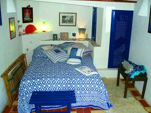 Schlafzimmer im Gästehaus mit französischem Bett Schlafzimmer im Gästehaus mit französischem Bett
