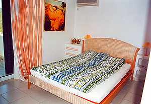 Ein Schlafzimmer im Ferienhaus auf Ibiza