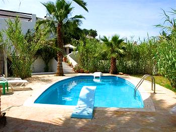 Ferienhaus mit Pool an der Cala Tarida Ferienhaus mit Pool an der Cala Tarida