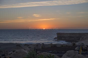 Relaxen am Strand bei Sonnenuntergang